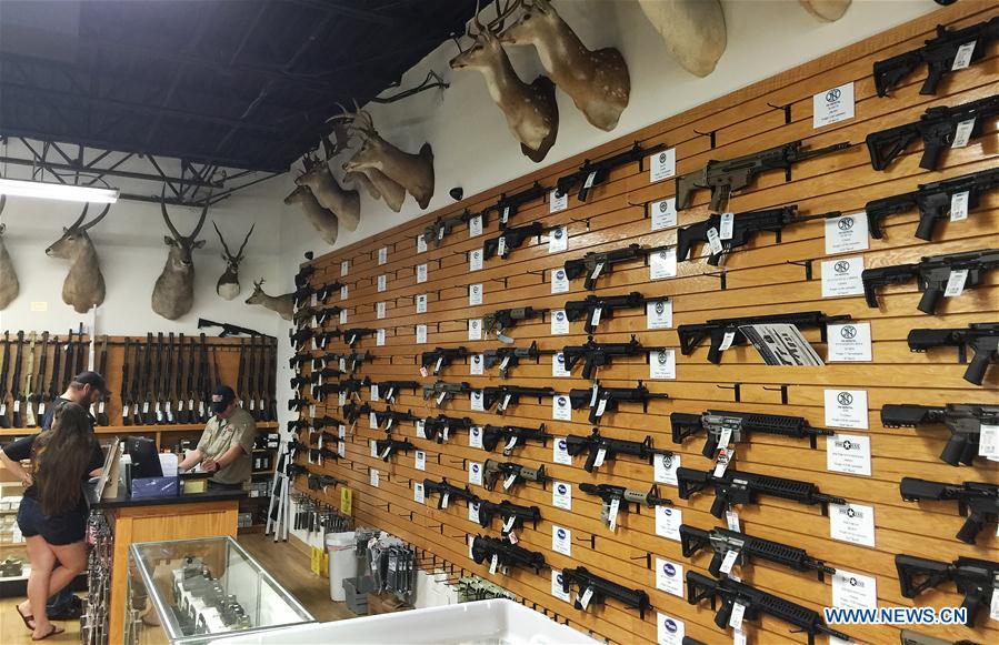 Photo taken with mobile phone on June 13, 2016 shows an AR-15 semi-automatic rifle at a shop in Orlando, the United States. Photo taken with mobile phone on June 13, 2016 shows an AR-15 semi-automatic rifle at a shop in Orlando, the United States.