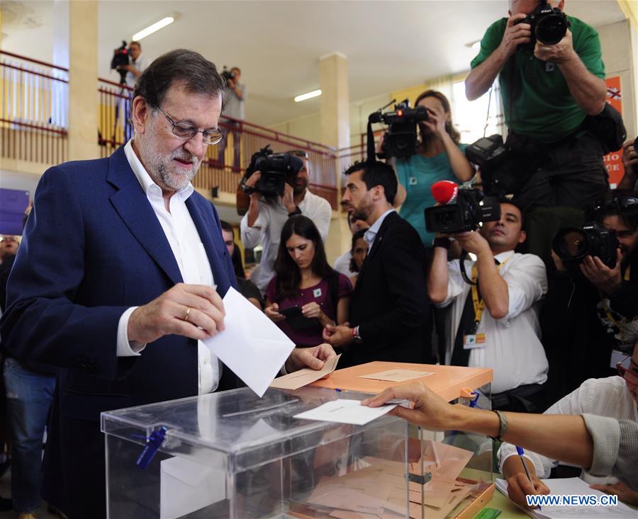 Mariano Rajoy, acting Spanish Prime Minister and the leader of the People's Party (PP), speaks after casting his vote at Bernadette School polling station in Madrid, Spain, on June 26, 2016. Mariano Rajoy, acting Spanish Prime Minister and the leader of the People's Party (PP), speaks after casting his vote at Bernadette School polling station in Madrid, Spain, on June 26, 2016.