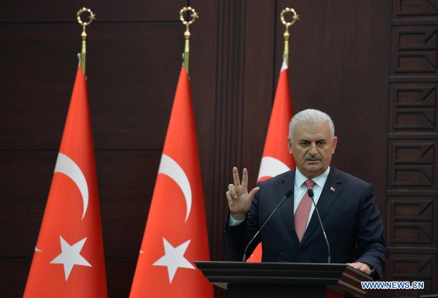 Turkish Prime Minister Binali Yildirim delivers a speech during a press conference after a Turkish-Israeli meeting, in Ankara, Turkey, on June 27, 2016. Turkish Prime Minister Binali Yildirim delivers a speech during a press conference after a Turkish-Israeli meeting, in Ankara, Turkey, on June 27, 2016.