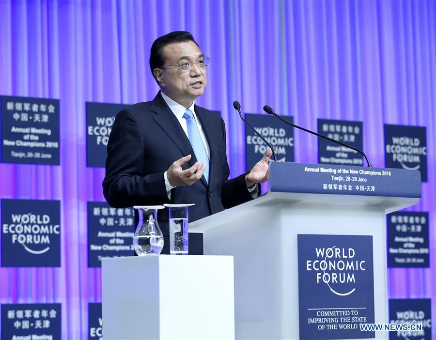 Chinese Premier Li Keqiang addresses the opening ceremony of the Annual Meeting of the New Champions 2016, or Summer Davos Forum, in Tianjin, north China, June 27, 2016.