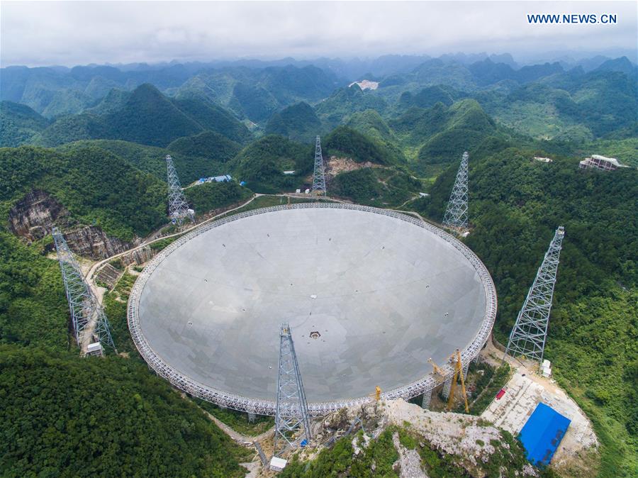 The aerial photo taken on July 3, 2016 shows the Five-hundred-meter Aperture Spherical Telescope (FAST) in Pingtang County, southwest China's Guizhou Province. 