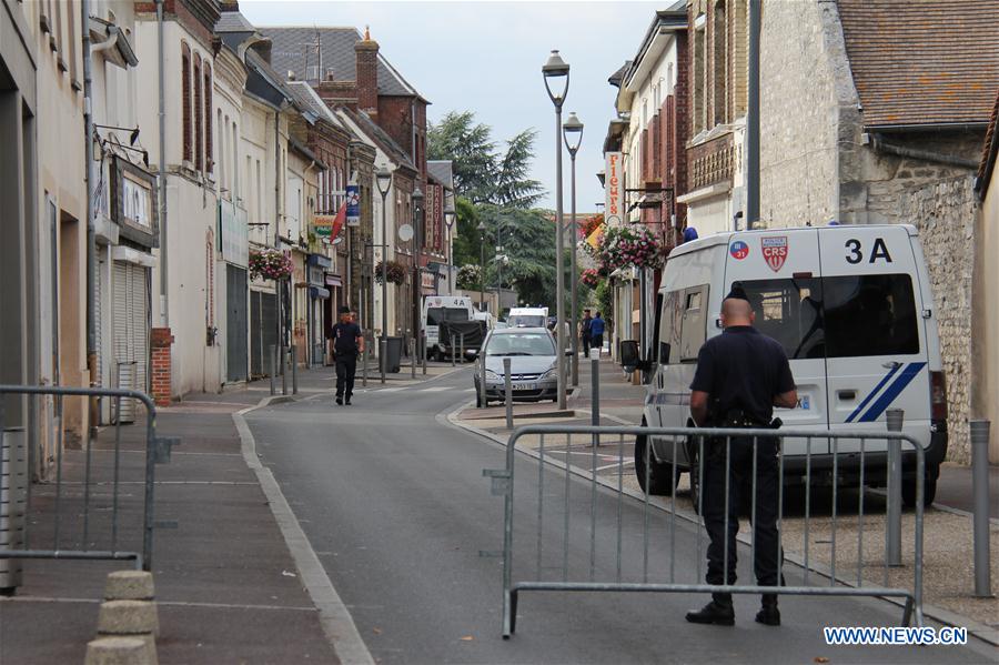 Police stand guard near the church where a priest was killed in Saint-Etienne du Rouvray, France on July 26, 2016. Police stand guard near the church where a priest was killed in Saint-Etienne du Rouvray, France on July 26, 2016.