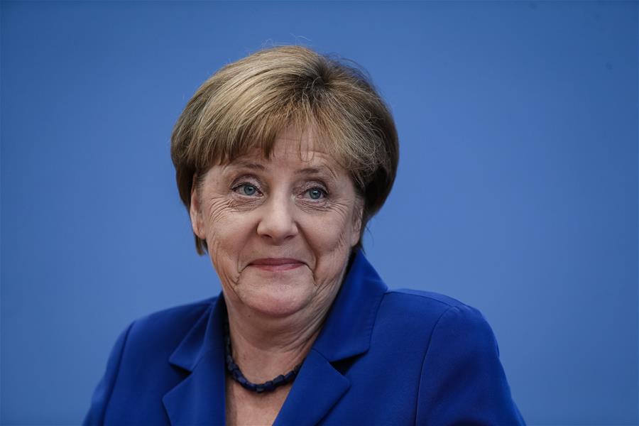 GERMANY-BERLIN-MERKEL-NINE-POINT-PLAN