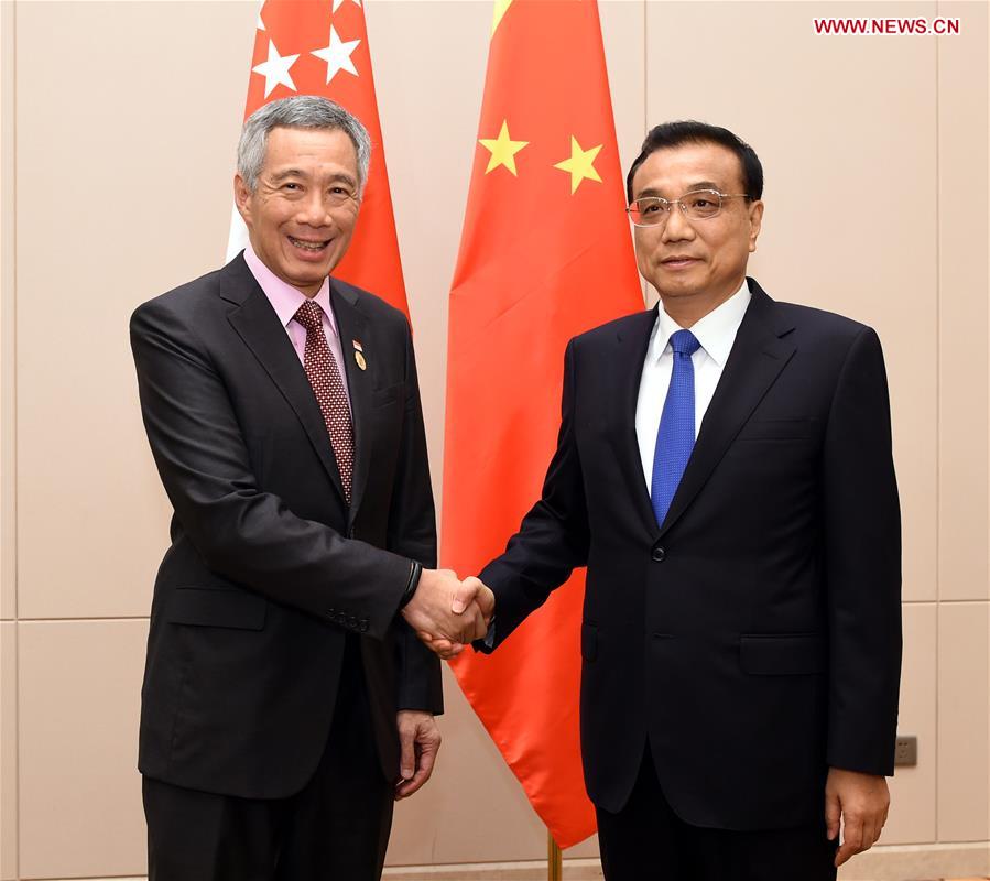 LAOS-CHINA-LI KEQIANG-SINGAPOREAN PM-MEETING