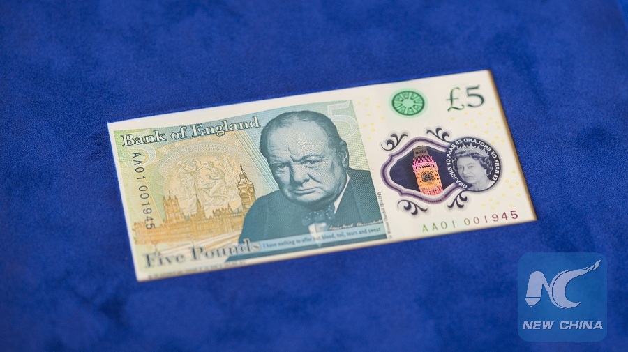 New 5 pound notes featuring Winston Churchill
