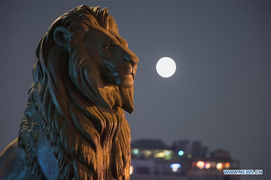 The multiple exposure photo shows the moon over the Qasr El-Nil bridge during the Chinese Mid-Autumn Day in Cairo, Egypt, Sept. 15, 2016. The multiple exposure photo shows the moon over the Qasr El-Nil bridge during the Chinese Mid-Autumn Day in Cairo, Egypt, Sept. 15, 2016.