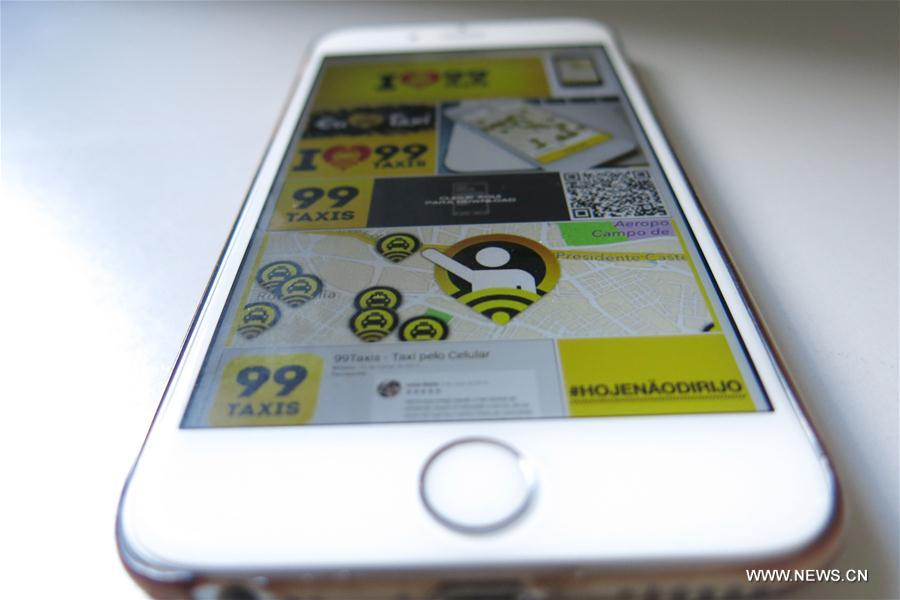 Chinese mobile transportation giant Didi Chuxing partnered with Brazil's largest local shared mobility provider 99 to promote ridesharing, the company announced Thursday. (Xinhua/Rahel Patrasso) 