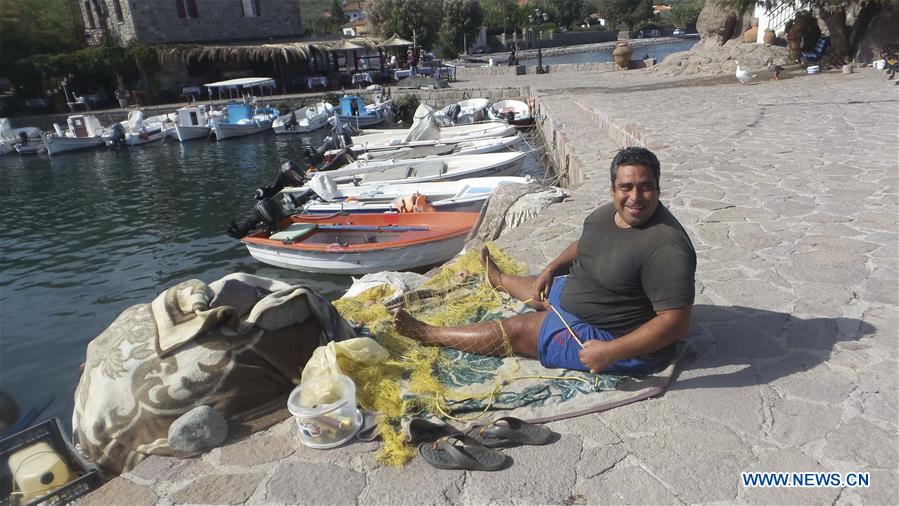 GREECE-LESVOS-FISHERMEN-REFUGEES-PRIZE
