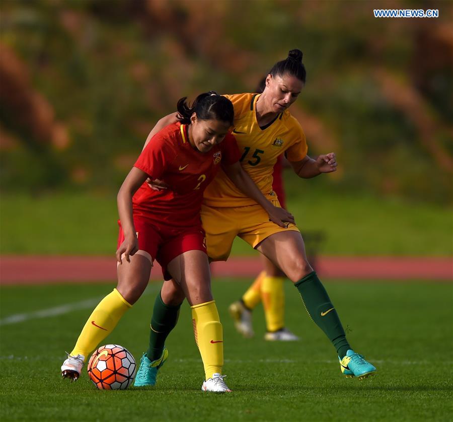 Liu Shanshan(L) of China vies with Emily Gielnik of Australia during the last round of Group C match between China and Australia at the Algarve Cup 2017 women's soccer tournament in Albufeira, Portugal on March 6, 2017.