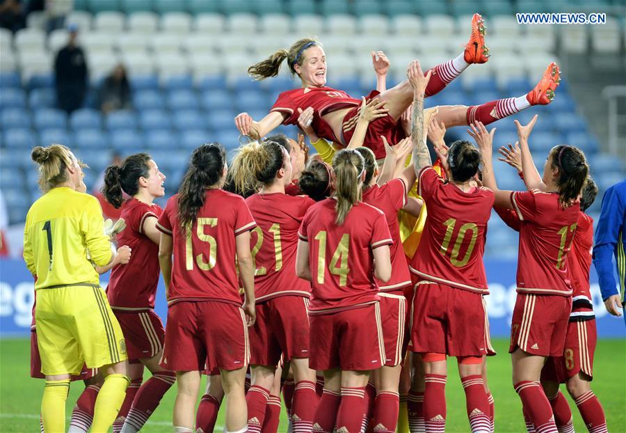 vPlayers of Spain celebrate after winning the final of 2017 Algarve Cup women's soccer tournament between Canada and Spain at the Algarve Stadium in Loule, Portugal, on March 8, 2017. 