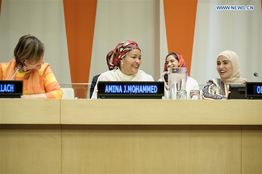UN Deputy Secretary-General Amina J. Mohammed (C) attends an event to mark the International Day of Happiness at the UN headquarters in New York, on March 20, 2017.