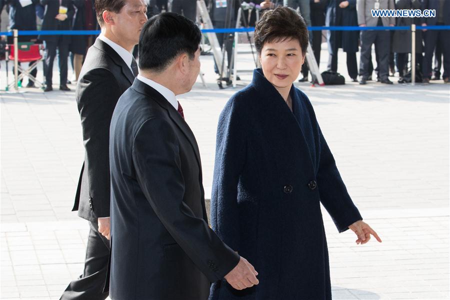 Ousted South Korean President Park Geun-hye (R) arrives at the prosecutors' office in Seoul, South Korea, March 21, 2017.
