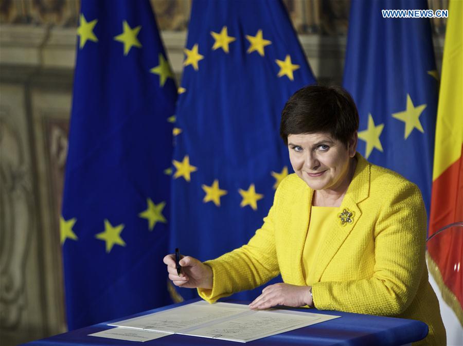 Polish Prime Minister Beata Szydlo signs the 'Declaration of Rome' during a ceremony at Capitoline Hill in Rome, Italy, on March 25, 2017. 