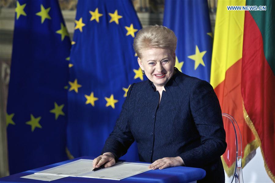 Lithuanian President Dalia Grybauskaite signs the 'Declaration of Rome' during a ceremony at Capitoline Hill in Rome, Italy, on March 25, 2017.