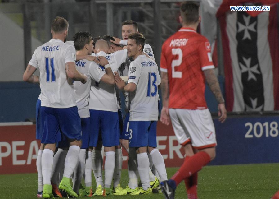 Players of Slovakia celebrate scoring during the FIFA World Cup European Qualifying match between Slovakia and Malta in Valleta, Malta, March 26, 2017. 