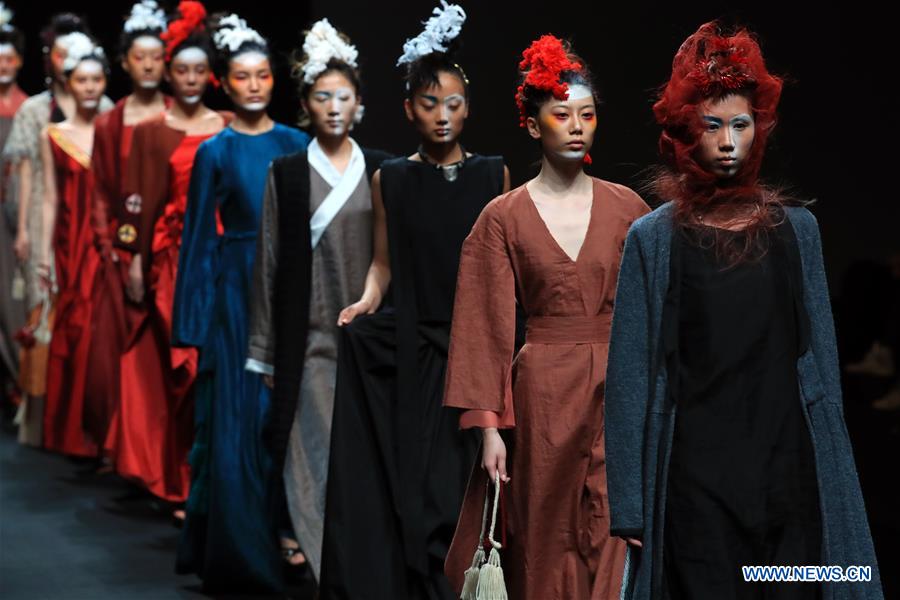 Models present creations at the AJ-Namo Collection Show during the China Fashion Week in Beijing, capital of China, March 30, 2017. (Xinhua/Li Mingfang) 