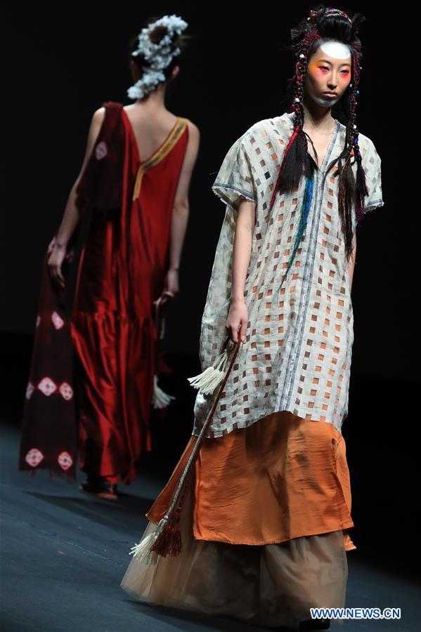 Models present creations at the AJ-Namo Collection Show during the China Fashion Week in Beijing, capital of China, March 30, 2017. (Xinhua/Li Mingfang) 