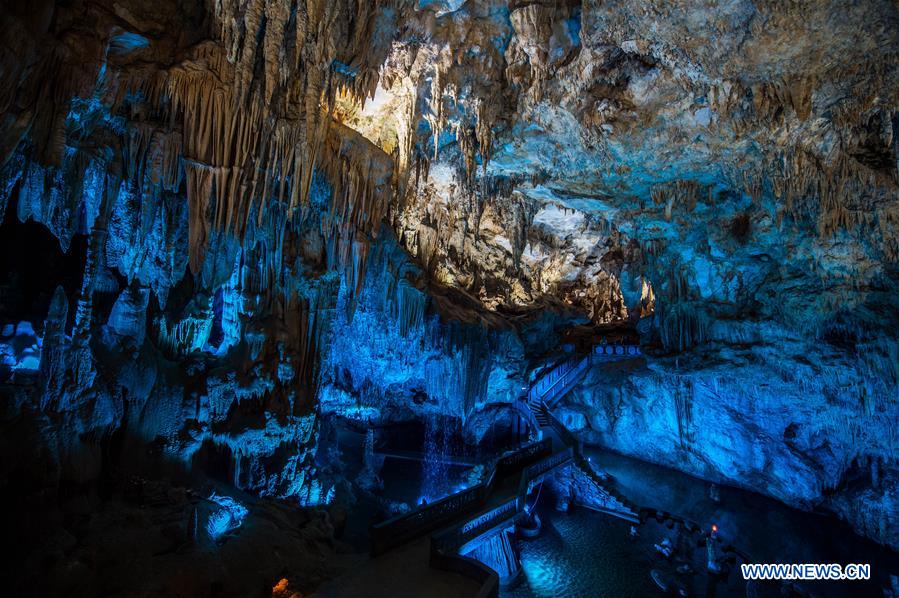 Photo taken on March 30, 2017 shows the interior of the Alu Caves in Luxi County, some 160 kilometers to Kunming, capital of southwest China's Yunnan Province. These ancient caves feature karst landscape and have been developed as a tourist destination. (Xinhua/Hu Chao) Photo taken on March 30, 2017 shows the interior of the Alu Caves in Luxi County, some 160 kilometers to Kunming, capital of southwest China's Yunnan Province. These ancient caves feature karst landscape and have been developed as a tourist destination. (Xinhua/Hu Chao)