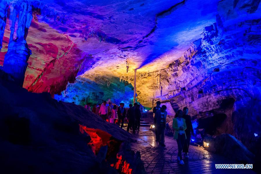 People visit the Alu Caves in Luxi County, some 160 kilometers to Kunming, capital of southwest China's Yunnan Province, March 30, 2017. These ancient caves feature karst landscape and have been developed as a tourist destination. (Xinhua/Hu Chao) 