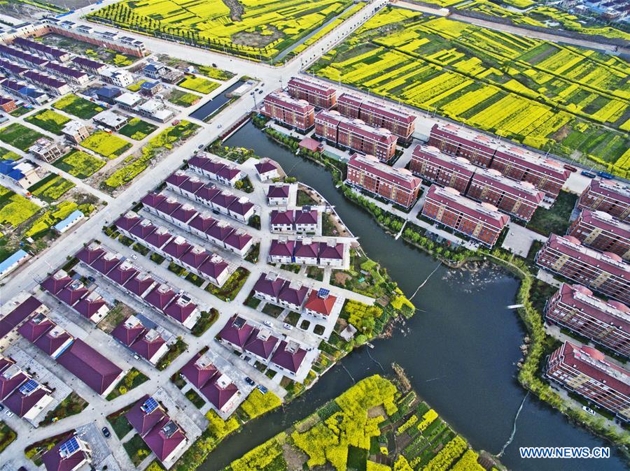 Aerial photo taken on April 3, 2017 shows spring scenery of the countryside in Xinba Town of Yangzhong City, east China's Jiangsu Province. (Xinhua/Chen Gang) 