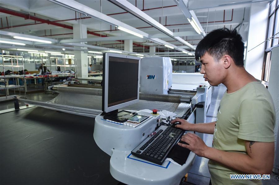 Automated garment manufacturing equipment introduced in Zhejiang, China