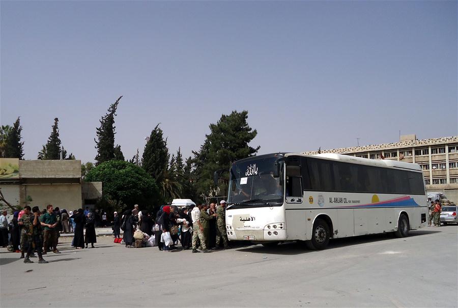 SYRIA-DAMASCUS-REBEL-FAMILIES-EVACUATION-FROM-QABOUN-NEIGHBORHOOD