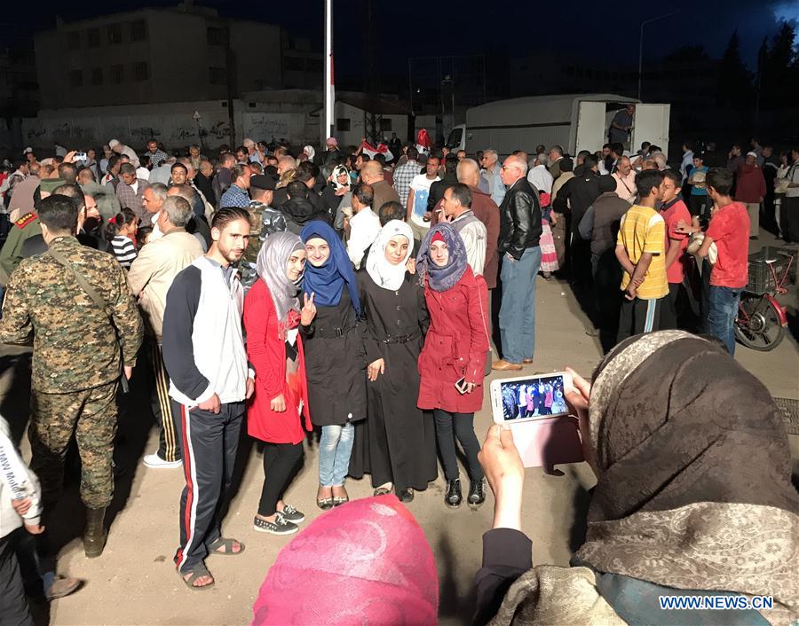 SYRIA-HOMS CITY-LAST BATCH OF REBELS-EVACUATION