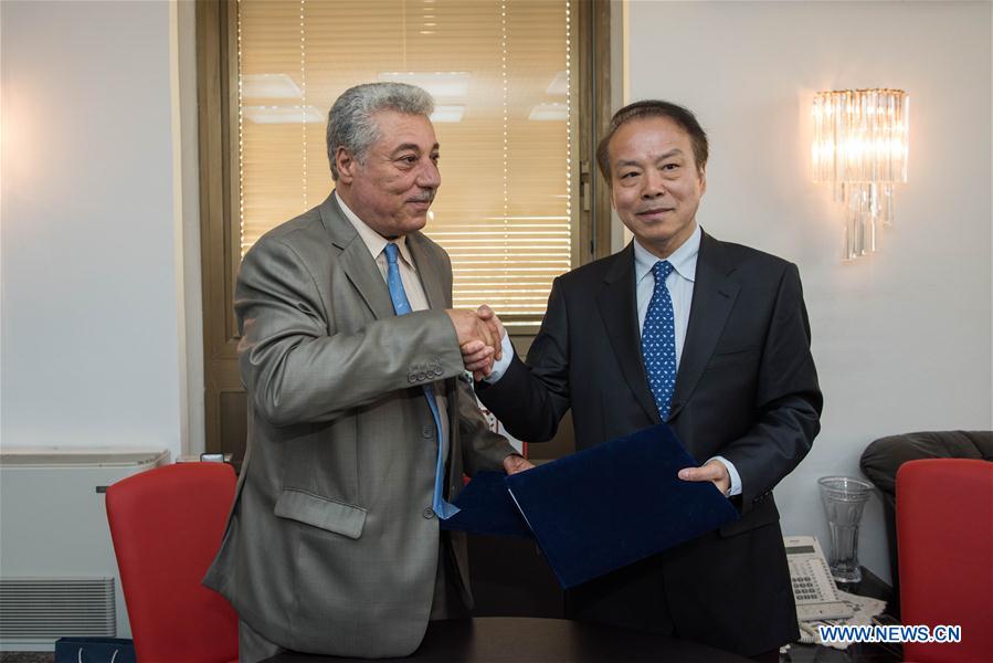 TUNISIA-TUNIS-TAP-CHINA-XINHUA NEWS AGENCY-HE PING-NATIONAL ALBUM PROJECT-MOU-SIGNING