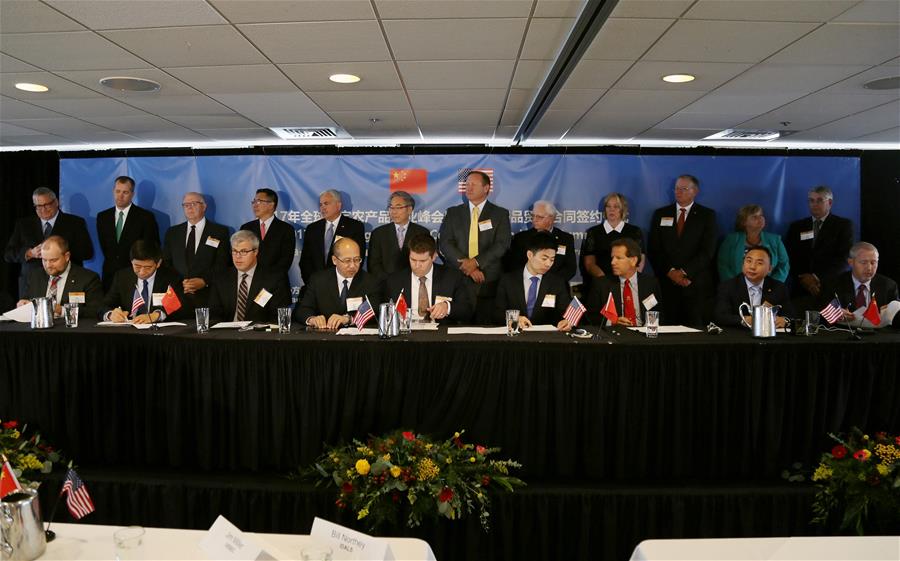 U.S.-DES MOINES-CHINA-AGRICULTURAL TRANSACTION CONTRACTS