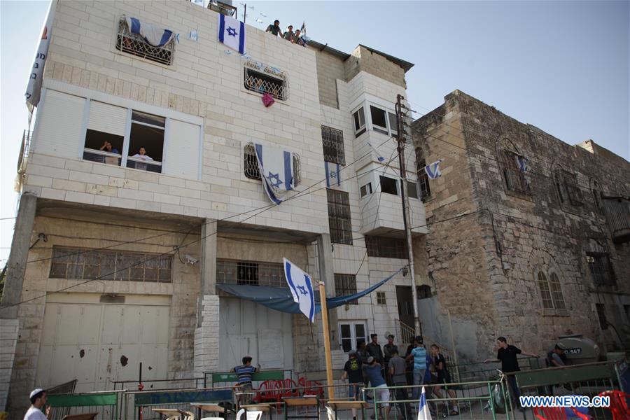 MIDEAST-HEBRON-PALESTINIAN-ISRAEL-CONFLICT-SETTLERS