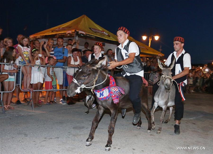 CROATIA-TRIBUNJ-DONKEY RACE