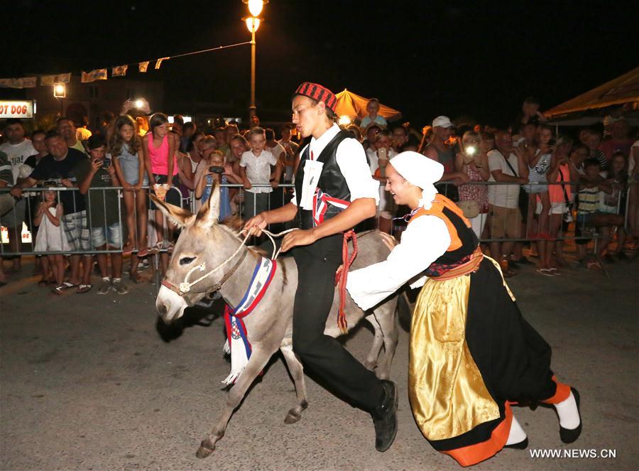 CROATIA-TRIBUNJ-DONKEY RACE