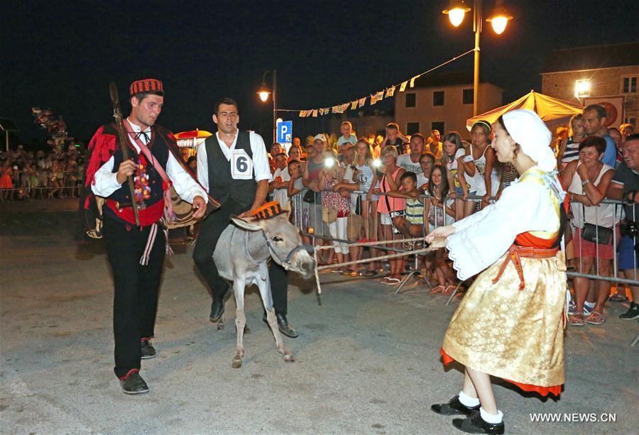 CROATIA-TRIBUNJ-DONKEY RACE