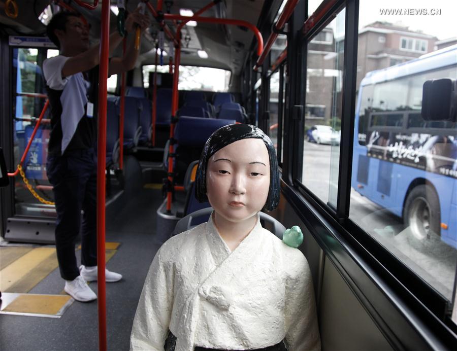 SOUTH KOREA-SEOUL-BUS-"COMFORT WOMEN"STATUE-DISPLAY