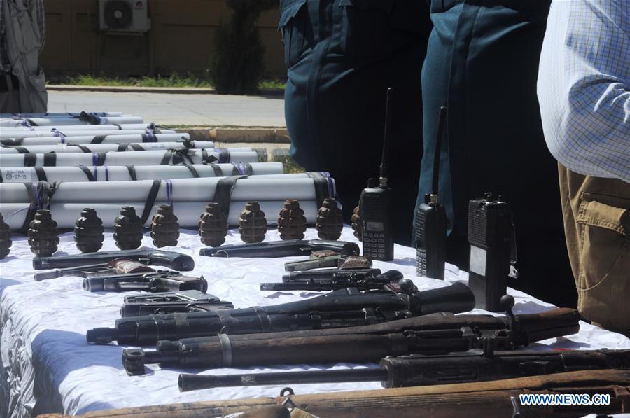 AFGHANISTAN-JAWZJAN-WEAPONS-HAND OVER