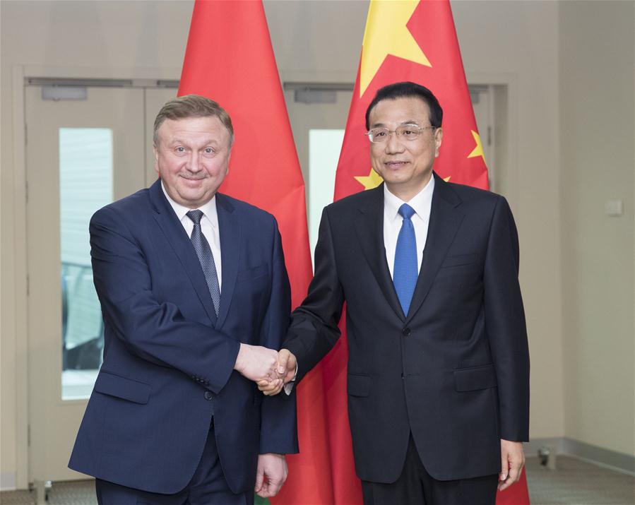 RUSSIA-SOCHI-CHINA-LI KEQIANG-KOBYAKOV-MEETING