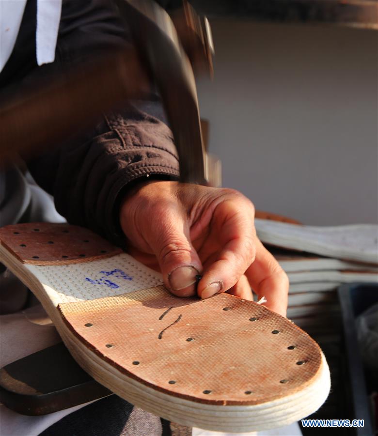 #CHINA-JIANGSU-HANDMADE SHOES(CN)