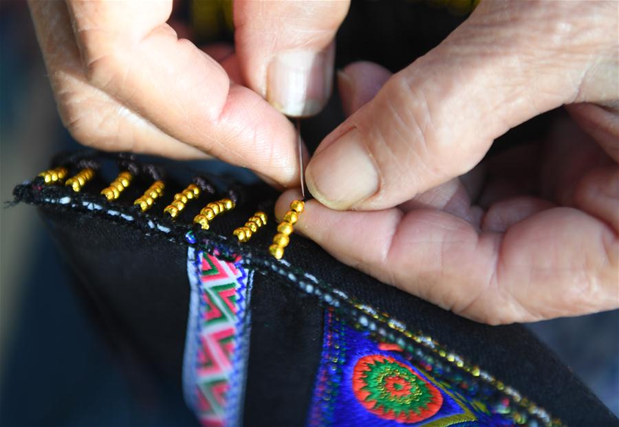 CHINA-GUANGXI-ZHUANG ETHNIC GROUP-COLORED EMBROIDERY (CN)