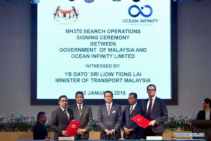 MALAYSIA-PUTRAJAYA-MH370-SEARCH OPERATIONS-SIGNING CEREMONY