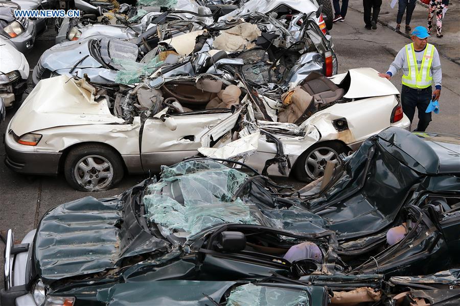 THE PHILIPPINES-MANILA-SMUGGLED LUXURY CARS-CRUSH