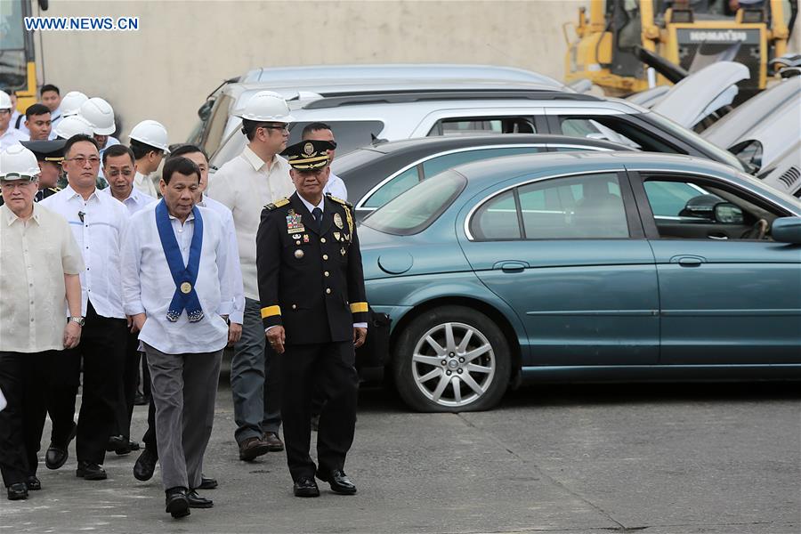 THE PHILIPPINES-MANILA-SMUGGLED LUXURY CARS-CRUSH