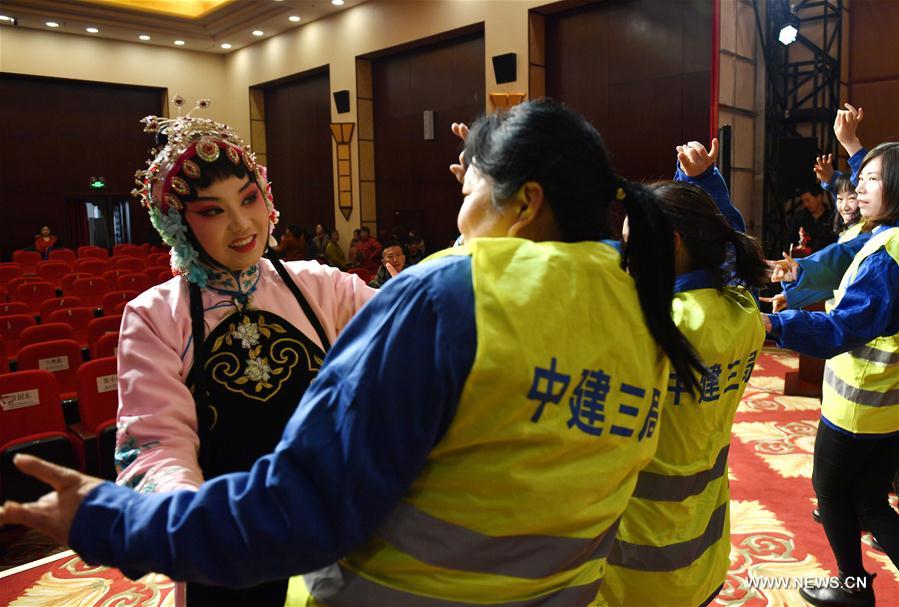 CHINA-BEIJING-PEKING OPERA-WOMEN'S DAY-WORKER-VISIT (CN)