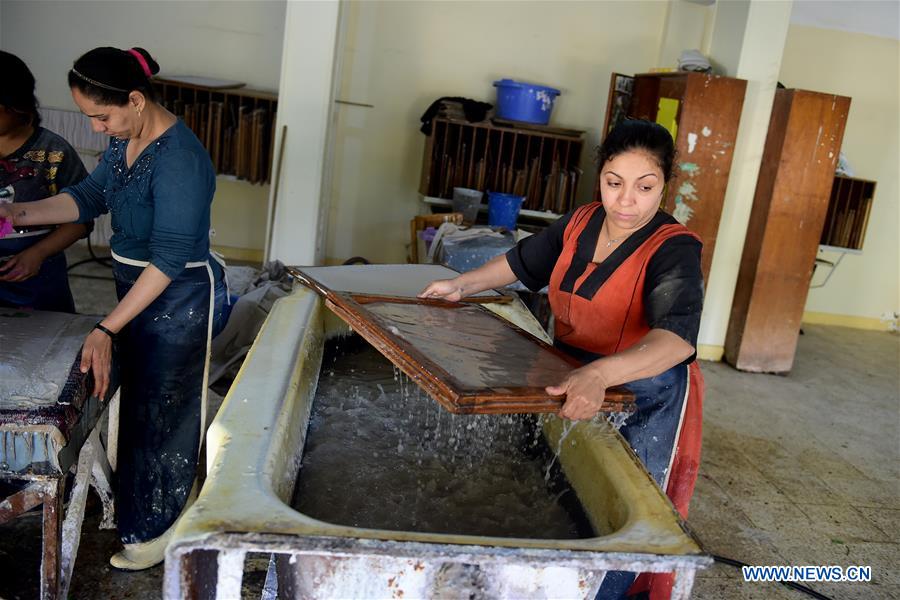 EGYPT-CAIRO-APE-WOMEN-GARBAGE-RECYCLING-PRODUCTS