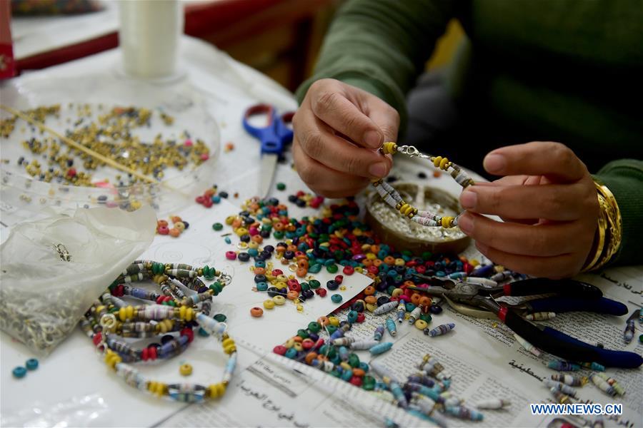 EGYPT-CAIRO-APE-WOMEN-GARBAGE-RECYCLING-PRODUCTS