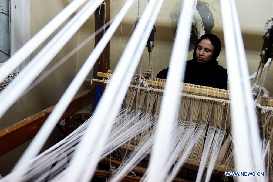 EGYPT-CAIRO-APE-WOMEN-GARBAGE-RECYCLING-PRODUCTS