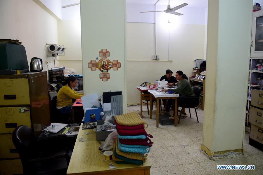 EGYPT-CAIRO-APE-WOMEN-GARBAGE-RECYCLING-PRODUCTS