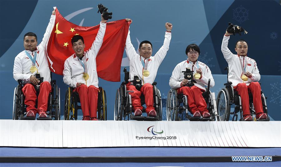China wins firstever Winter Paralympic medal with gold in wheelchair curling Xinhua English