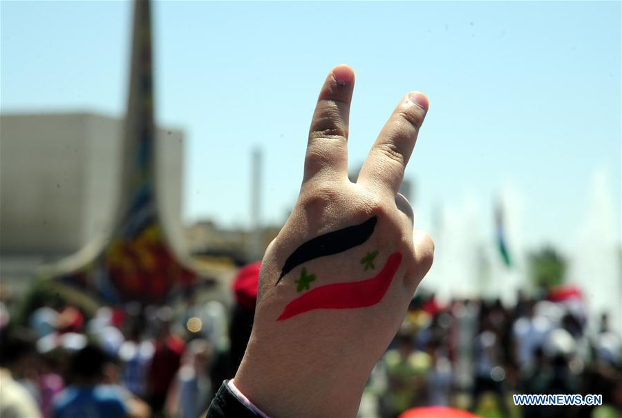 SYRIA-DAMASCUS-PRO-GOVERNMENT-RALLY