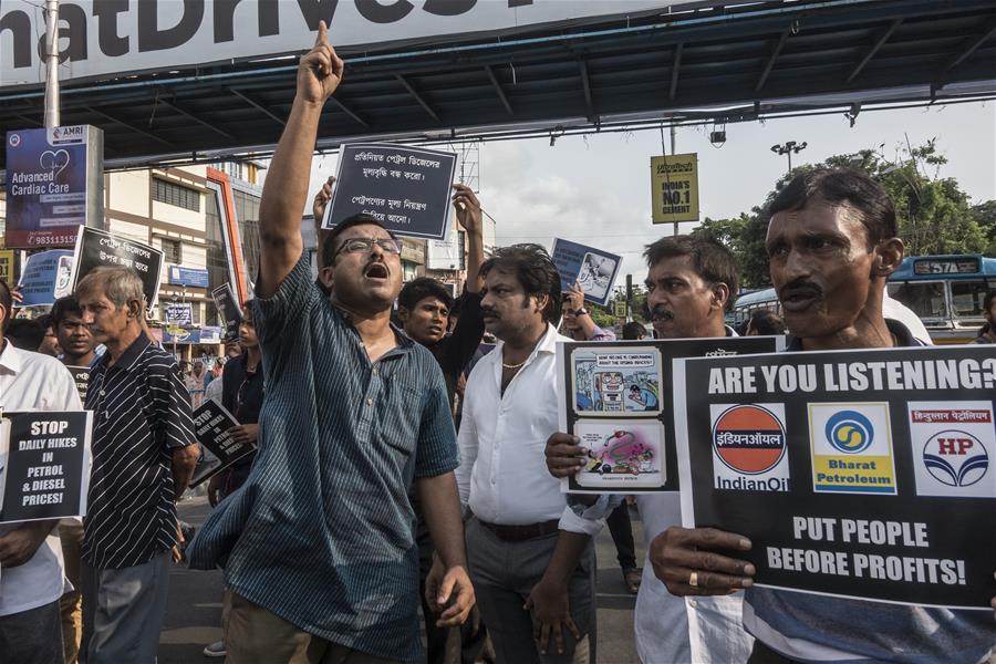 People protest against recent price hike of fuel in Kolkata, India