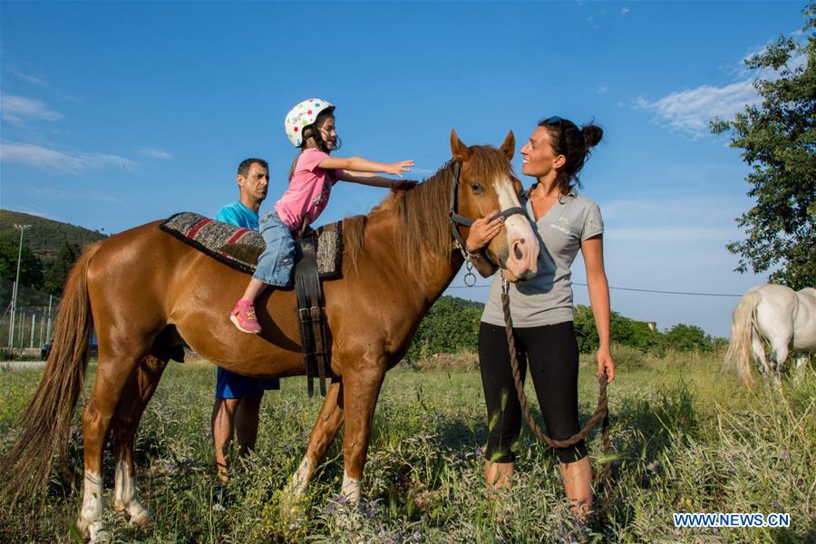GREECE-LARISSA-HORSE THERAPY-CHILDREN